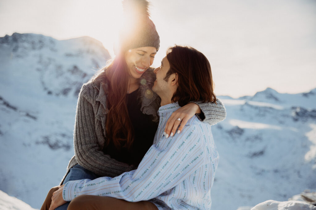 Couple getting engaged in Zermatt with view to the Mattrhorn and proposal photographer Zermatt